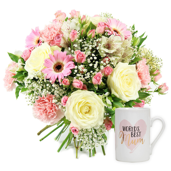 The image shows a beautifully coordinated Mother's Day gift set, photographed in crisp, even light against a pure white backdrop, reminiscent of the calm interiors of a small Tufnell Park florist. Dominating the left side is a lush, rounded bouquet that feels both full and airy. At its core are several generous cream roses in full bloom, their petals curving outwards in perfect spirals, giving a sense of quiet elegance. Nestled among them are soft pink carnations, each ruffled petal catching the light, and petite clusters of darker pink spray roses that create small pockets of vivid colour. Scattered throughout are bright pink gerbera daisies, each bloom with a dark central disc ringed by neat petals, adding structure and a friendly, uplifting character. Fine white alstroemeria with slender petals, streaked delicately with reddish-brown markings, thread gracefully through the arrangement, while countless tiny blossoms of white gypsophila fill in the gaps, creating a cloud-like, romantic softness. Here and there, glossy green leaves peek through, providing a fresh contrast that suggests the bouquet has just been arranged and is ready for same-day delivery around Tufnell Park, Gospel Oak, or Kentish Town. The stems at the base are neatly gathered and left visible, emphasising the hand-tied craftsmanship. On the right stands a pristine white ceramic mug with a classic curved handle, positioned facing the viewer so its message is clear. The mug's design shows a light, watercolour-style pink heart, within which the words WORLD'S BEST appear in crisp black text above the word Mum, written in a flowing metallic gold script that catches the eye. Together, the softly coloured bouquet and the sentimental mug form a heartfelt, visually soothing tribute to a cherished mum or mother figure.