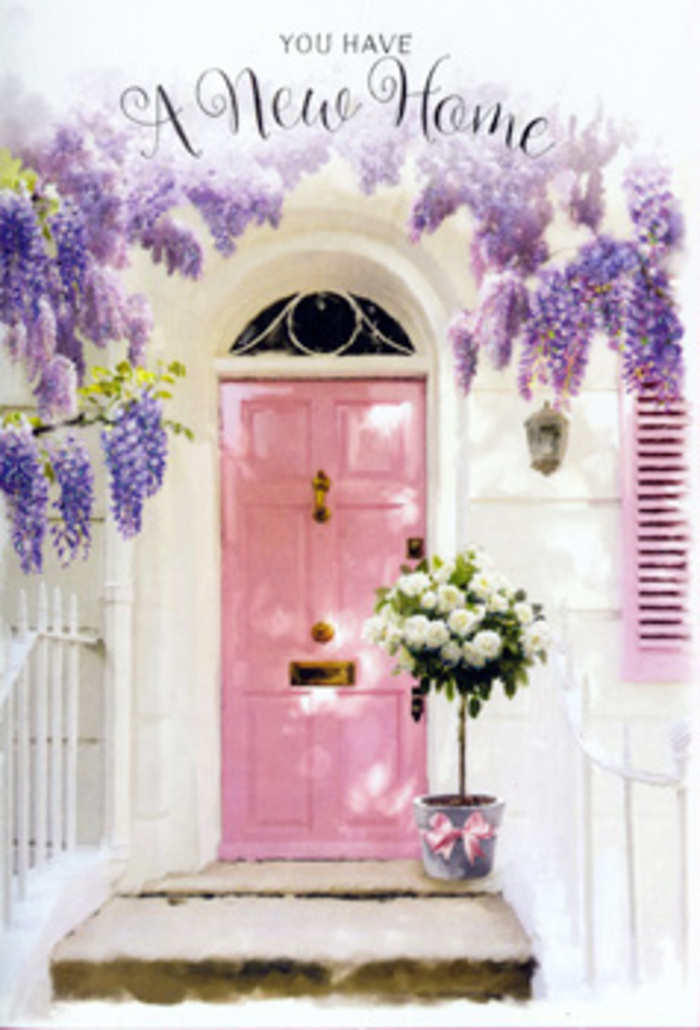 You stand as if at the foot of a new Tufnell Park home, looking up at a painted pink door framed by a gentle cascade of wisteria in full, lilac-toned bloom. The vines fall in layers, their blossoms dusting the whitewashed wall like watercolour brushstrokes, creating dappled shadows that drift over the door and the pale shutter beside it. The door itself carries a soft, rosy hue, something between blush and powdered pink, the kind of welcoming colour that glows quietly on a late afternoon near Tufnell Park station. At the base of this pastel entrance rests a stylish metal bucket in a subdued grey, brimming with a generous bouquet of white and cream roses. Each rose is fully opened yet still fresh, petals plush and almost buttery, arranged with an expert hand so they appear both abundant and effortless. Fresh greenery is interlaced between the blooms, not overpowering but adding depth and gentle movement, like a whisper of the nearby green spaces that thread through North London. Around the bucket's base is a satin pink bow, softly tied, its sheen catching the light and echoing the door's colour in a delicate visual rhythm. You can almost imagine the scent: the rose's creamy perfume mingling with the powdery notes of wisteria, drifting out to greet anyone who pauses at the step. This tender, artful scene feels made for marking a housewarming in Tufnell Park, a floral embrace that turns a simple doorway into a lasting memory of warmth, welcome, and the beginning of a new chapter.