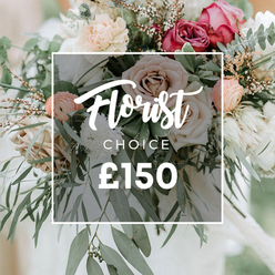 This hand-tied bouquet reads like a small, cultivated wild garden: creamy and dusty-peach garden roses open wide beside deeper mauve and rich fuchsia blooms, their layered petals catching a gentle, diffused light. Ruffled peach ranunculus provide soft, concentric centers, while clusters of fine white chrysanthemums and feathery gypsophila give the design moments of airy brightness. Ochre-brown branching twigs weave between the blooms, lending a rustic skeleton that keeps the composition lively rather than formal. Lush sprigs of silvery eucalyptus and mixed green foliage form a cool, textured frame around the flowers, the eucalyptus lending its faint, fresh scent amid the warmer rose perfume. The bouquet's silhouette is loose and slightly bohemian, the kind of sophisticated, romantic style often chosen for weddings or luxury gifts. Central to the image is a neat white rectangular overlay holding the words "Florist Choice" in a flowing white script paired with uppercase sans-serif text beneath, and a clear price of "£150" in bold numerals - visual cues that this is a curated artisan option. The soft-focus backdrop suggests pale fabric drapery or a bridal gown bathed in morning light, keeping the eye on the tactile contrasts of velvet petals and silvery leaves. For anyone familiar with local life around Tufnell Park - the leafy side streets off Fortess Road or the weekend stalls near Brecknock Road - this bouquet feels like a familiar, handcrafted gesture: thoughtful, scented, and ready to be delivered for a moment worth celebrating.