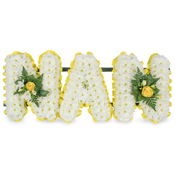 A lovingly crafted sympathy tribute reads MAM in three separate capital letters, each letter densely covered with tiny white chrysanthemum sprays to produce a soft, textured surface that catches the light like fresh linen. Every letter's edge is meticulously bordered with a sunny yellow pleated ribbon, the colour of warm afternoon sun, which crisply frames the white flower faces and creates a neat, uplifting outline. The arrangement is completed with two modest accent clusters positioned on the outer M letters: each cluster centres on a compact, softly furled yellow rose bud, surrounded by small white freesia-like buds and a mix of dark green fern fronds and glossy leaves that add depth and a living contrast to the pale blooms. Behind the upper portions of the three letters a slender dark green or black support bar runs discreetly from left to right, giving the composition structure for standing display without breaking the visual flow. Set against a plain white background, the yellow and white palette reads with purity and warmth, and the satin ribbon's sheen and the chrysanthemum's cushiony texture are especially noticeable in soft daylight. This piece is designed for memorial services and graveside remembrance, a quiet but unmistakable homage to a mother or maternal figure. Prepared by a florist serving the Tufnell Park area and nearby Kentish Town, this arrangement would be suitable for delivery to chapels around Fortess Road or for placing at a family memorial in one of the neighbourhood's peaceful cemeteries, conveying gentle consolation and lasting affection. Flowers Tufnell Park ensures the flowers are staged to preserve their dignity and clarity for the service.