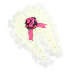 An exquisite angel-wing funeral arrangement is displayed on a pure white background, its serene form capturing the eye before the details slowly unfold. Both wings are crafted from a dense tapestry of tiny white chrysanthemums or similar button flowers, each bloom placed so closely that the surface feels like a continuous, cloud-like blanket, with soft green centres peeking through to lend natural depth. The wings sweep outward in a gentle arc, their shape edged all around with a narrow border of white feathers that appear light and downy, as though stirred by the faintest breath. At the point where the wings meet, a lavish satin bow in vivid fuchsia pink anchors the design, the ribbon loops plump and lustrous, its trailing ends resting softly on the floral surface. Cradled in the centre of this bow is a single pale pink rosebud, its petals neatly furled, symbolising a life cherished with quiet devotion. Around the rose, a small collar of dark purple thistle-like blooms or textured foliage adds a deeper undertone of colour, echoing twilight hues over the rooftops of Tufnell Park and nearby Kentish Town. The composition conveys a sense of protection, peace, and spiritual uplift, the kind of bespoke tribute a local family might request for a heartfelt service close to home. Created with the practiced hands of a florist who understands both the craft and the emotions behind farewell flowers, this angel-wing design offers a gentle way to say goodbye while keeping memories close.