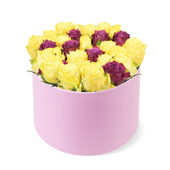 Elegant in its contrast and harmony, this box arrangement speaks to a modern Tufnell Park sensibility. The pale pink round box sits low in the frame, its soft matte finish providing a refined backdrop for the blooms. The dense cluster centers on bright yellow roses, their petals opening with a sunny, lemon-bright glow that feels fresh and uplifting in a spring day in north London. Interspersed among them are deep burgundy or purple roses, their velvet tone bringing depth and luxury to the display. The blooms are packed tightly, creating a plush, almost decadent mass that still reads as meticulously curated. The pink box itself, with its soft-touch surface, feels tactile and premium, a thoughtful present that looks exceedingly current on a coffee table or a mantel. The overall effect is celebratory yet intimate--ideal for milestone moments, a grand romantic gesture, or simply to brighten someone's day. Crafted with care by Flowers Tufnell Park, this arrangement speaks to the artistry and intention that define North London gifting. Available for same-day delivery to nearby streets and neighbourhoods, from Archway to Kentish Town and beyond, it carries a sense of place that makes it feel truly local.