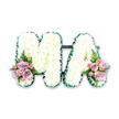 The image captures a dignified floral letter tribute spelling MA, designed as a loving message of remembrance. Set against a plain white background, the arrangement stands out with crisp clarity, allowing every detail to be appreciated. Each capital letter is filled entirely with immaculate white chrysanthemums, their small, daisy-like heads arranged in tight rows so that the texture appears thick, cushiony, and almost cloud-like. The flowers look fresh and cool, the centres a hint of pale green, creating the classic look so often chosen for funeral tributes. Along the outer edge of both letters, a band of deep, glossy green frames the design, likely formed from folded ribbon or finely arranged foliage. This neat border provides definition, giving the letters a strong silhouette and a polished, professional finish. At the lower left of the M and the lower right of the A, two matching floral sprays soften the structural look. Each spray features soft pink roses and lilac-toned roses mingling with smaller pink spray roses, their petals layered and gently curled. Light, airy fronds of fern and leaves emerge around them, adding a touch of natural movement. The combination of white with blush and lavender tones creates a feeling of tenderness and gratitude, as though the flowers are quietly saying thank you and we love you on behalf of the family. It is easy to imagine this MA tribute resting among other arrangements at a Tufnell Park funeral, having been delivered that morning by a trusted local florist who knows how important every detail can be on a day of goodbye.