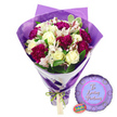 On a clean white studio-style background, a thoughtfully arranged romantic bouquet is paired with a foil balloon, evoking the kind of intimate celebration often seen in Tufnell Park apartments and townhouses. The bouquet is hand-tied and full, dominated by creamy white roses whose petals are tightly wrapped yet subtly curved at the edges, as though they are just beginning to open. These roses are woven with clusters of deep magenta to burgundy carnations whose tightly packed, ruffled petals create an almost cloudlike texture, giving the arrangement a luxuriant feel. Nestled among them are crisp white alstroemeria flowers, each blossom composed of long, slender petals lightly brushed with reddish-brown striping and freckles on their inner surfaces, adding a refined, almost painterly detail. Around the blooms, a collar of fresh green foliage, including a few variegated leaves with creamy margins, brings structure and a hint of the greenery found along nearby Campdale Road. The florist has wrapped the stems in two distinct layers: an inner layer of smooth white paper that forms a clean diagonal band at the base, and an outer veil of translucent purple cellophane, gently crinkled and extending above the flower heads to form soft, irregular peaks. This purple film catches light and subtly tints the edges of the arrangement, giving the whole bouquet a soft lavender glow. The stems are neatly gathered and finished with a thin bright green satin ribbon tied into a small bow, from which hangs a plain light brown tag poised for a handwritten note. To the right of the bouquet, a round metallic purple balloon with a scalloped rosette-style edge lies flat on the white surface. Its central panel, in a lighter lavender tone, carries the words To Loving Partners in a flowing script, signalling its role as a tribute to shared love. A small rainbow holographic sticker on one side adds an extra flicker of colour, completing a coordinated gift ideal for anniversaries, Valentine's surprises, or quiet celebrations in Tufnell Park homes.