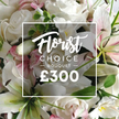 From the soft morning light in a well-lit studio near Tufnell Park, this Florist Choice Bouquet is captured in a rich, close-up frame that lets every petal glow. The arrangement centers on pristine white roses in multiple stages of bloom-some tight and crisp, others blooming open with a satin shimmer-paired with white lilies whose inner petals carry a delicate pink tinge, like the first blush of dawn. Tiny hints of smaller pale pink blossoms nestle among the larger blooms, and a swirl of fresh green foliage, likely eucalyptus, threads through the bouquet, adding texture, depth, and a faint, resinous scent. The composition feels lush and abundant, as if the bouquet could spill from its unseen base and continue to breathe beyond the frame. In the center, a white rectangular overlay sits cleanly over the florals, bordered by a fine line, displaying the text: Florist in an elegant, script font, CHOICE in a crisp sans-serif uppercase, followed by ? BOUQUET ?, and finally ?300 in bold white numerals. The overall effect is opulent yet refined, a high-end gift ready to mark anniversaries, milestones, or a thoughtful gesture of care. This image embodies the craft of Flowers Tufnell Park, a local studio known for precise selection and generous presentation. Delivered with care, the bouquet reads as a promise of freshness and beauty, available for same-day delivery across the Tufnell Park area, including Holloway Road, Kentish Town, and beyond, perfect for gifting or personal celebration.