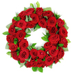 A vibrant and striking circular wreath of numerous deep red roses forms a perfect circle against a pristine white backdrop. The roses are densely packed, their velvety petals opening in varied stages from tightly furled buds to lush, fully unfurled blooms that catch soft light and display subtle shading. Interspersed among the blooms are clusters of bright green foliage, some broad and matte, others slender and glossy, providing a natural verdant frame that heightens the intensity of the crimson. This classic tribute is widely recognized as a symbol of love, remembrance, and respect, and is commonly chosen for funerals, memorial services, or Remembrance Day ceremonies. Crafted by a local North London florist, it carries the weight of sympathy and the promise of enduring memory for communities from Tufnell Park to Kentish Town and beyond. Available for same-day delivery across the area, it stands as a dignified sign of condolence and support, a wreath that speaks quietly of connection and care. Flowers Tufnell Park brings this sense of solemn beauty to residents, friends, and families near Archway and Primrose Hill.