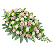 An elongated, teardrop-style funeral spray lies against a crisp white background, its gentle form and pastel palette inviting quiet reflection. The design is fuller and more rounded towards the upper left, then gradually narrows to a soft, pointed tip on the lower right, creating a sense of direction and flow, like a slow, thoughtful walk through the quiet streets around Tufnell Park and Junction Road. The main visual impression comes from a generous abundance of pink roses, presented in varied tones from the faintest blush to a more pronounced rose pink. Some of these roses are tightly wrapped, their petals spiralling inward, while others are open and layered, revealing plush, velvety centres that feel both tender and dignified. Interspersed among them are clean white carnations and spray carnations, their finely ruffled petals forming small, rounded tufts that add volume and a soft, cloud-like brightness. Around and beneath the flowers lies a structured bed of mixed greenery. Dark, glossy green leaves provide definition at the edges and cradle the blooms, while circular, silvery-green eucalyptus leaves introduce a cooler hue and an airy sense of lightness. Extending beyond the main outline, especially from the right-hand taper, are slim trails of dark green ruscus or similar trailing foliage, gently cascading to give the arrangement a more organic, flowing character. The lighting is even, with no harsh shadows, highlighting the freshness of each stem and the careful craftsmanship. Overall, the spray feels serene, respectful, and consoling-an ideal floral tribute for a funeral service or memorial gathering in Tufnell Park, offering visual comfort and a heartfelt symbol of support to grieving families.