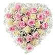 This captivating heart-shaped bouquet, composed of approximately thirty blush pink and creamy white roses, is carefully nestled atop a pristine white setting. Each rose-some just budding, others circling open in velvety perfection-reveals tones that gently transition from soft, romantic pink to sophisticated cream, with hints of ivory and pale yellow lending depth. The artistry of local Tufnell Park florists is evident in the way each rose is set against a wispy border of baby's breath, creating a perimeter as light and airy as a morning cloud. Compactly woven clusters of baby's breath also peek throughout the heart, softening its outlines and drawing the eye towards the bouquet's full, abundant core. The arrangement's crisp lines and expert composition make it an ideal symbol of affection, memory, and gentle support-one that feels deeply connected to Tufnell Park's caring neighbourhoods, from Junction Road to the nearby townhouses on Lady Somerset Road. Whether shared in moments of remembrance or as a heartfelt gesture for special occasions, this bouquet brings together elegance and warmth-emphasizing the enduring love that links families and friends in Tufnell Park.