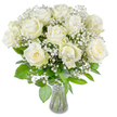 A serene, classic bouquet of full white roses sits centered in a simple clear glass vase, photographed against a clean white backdrop so each petal and leaf reads quietly and clearly. Around a dozen large roses open in gentle spirals, their outer petals a pure, cool white while a few centers carry a soft creamy-yellow tone that gives the blooms a warm, inner glow. Sprays of tiny white gypsophila thread between the roses like puffs of morning mist, their clustered blossoms creating an airy halo that softens the composition and lets the larger roses breathe. Beneath the blooms, lush green foliage fans out in varied textures and tones-rounded, waxy leaves and longer, veined stems-providing a living counterpoint to the ivory petals and grounding the display with natural depth. The clear vase has a modest flare and reveals neatly trimmed stems and clear water, adding to the arrangement's sense of freshness and restraint. Even, bright lighting lifts the whites so they appear luminous without glare, and the overall mood is one of unassuming grace-appropriate for a quiet sympathy tribute, a wedding accent, or a tranquil centrepiece for a living room. If placed on a windowsill near Tufnell Park Road or on a mantel facing Dartmouth Park, the bouquet would bring a soft, contemplative brightness to the space. The scent is suggested rather than overpowering: a delicate, clean rose perfume threaded with green, leafy notes that invites calm. A florist's composition that honours simplicity and comfort, this arrangement quietly promises solace and understated beauty.