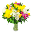 A bright, joyful bouquet of mixed flowers stands proudly in a clear glass vase, photographed against a pristine white background that throws every colour into sharp relief. The arrangement is densely packed and gracefully rounded, creating a sense of fullness and generosity. Dominant within the design are sunny yellow roses and large, spherical yellow chrysanthemums, whose tightly ruffled petals form textured cushions of colour. Nestled among them are airy clusters of white daisy-like flowers, each with a lime-green centre that adds a crisp, almost zesty contrast, echoing the freshness of a wildflower patch. Fluffy white chrysanthemums are woven throughout, softening the overall look and lending the bouquet a light, cloud-like quality. Vibrant magenta and fuchsia chrysanthemums provide bold, modern flashes of colour, while more delicate, pastel pink blossoms sit slightly lower in the arrangement, adding subtle depth and a gentle, affectionate note. Deep green foliage with smooth, glossy, oval leaves curves around and through the flowers, anchoring them and framing the brighter tones with a cool, calming backdrop. The stems are clearly visible through the curved sides of the vase, resting in clear water that hints at same-day freshness from a local Tufnell Park florist. The lighting appears natural and even, suggesting flowers just finished on the workbench, ready to be delivered to a townhouse near Tufnell Park Fields or a cosy flat off Junction Road. The mood is uplifting, relaxed, and approachable, ideal for sending birthday wishes, cheering up a friend, or adding a burst of colour to an everyday London living room.