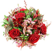 Captured from a bird's-eye view against a bright white background, this bouquet appears like a carefully painted circle of luxurious reds, soft pinks, and lively greens, the sort of romantic hand-tied design often sent to homes around Tufnell Park and neighbouring streets. At the centre, deep crimson roses take pride of place, their velvety petals fully unfurled, forming rich, layered rosettes that immediately draw the eye and suggest passion, commitment, and classic elegance. Threaded amongst them are sprays of pale pink waxflowers, their tiny star-shaped blooms and subtle yellow centres clustered along slender stems, bringing a delicate, almost whimsical contrast to the bold roses. The entire arrangement is cradled by a ring of lush green foliage in various shapes and sizes, from smooth, rounded leaves to more elongated forms, all in vivid, healthy shades that enhance the freshness you'd expect from same-day local delivery. Adding a note of sophistication, bronzed and burgundy-toned leaves are artfully tucked between the greens, some displaying fine reddish-brown veins that lend a hint of autumn warmth and gentle metallic sheen when the light falls across them. Smaller dark red flowers, reminiscent of alstroemeria or similar bell-shaped varieties, are scattered through the bouquet, intensifying the spectrum of red and adding subtle depth and texture around the central roses. The bouquet is constructed into a generous, domed shape, dense yet balanced, with each blossom carefully positioned so no colour overwhelms another. Near the bottom edge, a glimpse of red and white patterned tag or ribbon emerges from the foliage, suggesting this is a thoughtful gift awaiting delivery to a flat near Tufnell Park station or a cosy home just off Fortress Road. The overall impression is one of refined romance and heartfelt gratitude, ideal for anniversaries, Valentine's surprises, or celebratory evenings in North London.