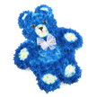 A lovingly detailed teddy bear made entirely of flowers is shown against a bright white background, appearing both playful and deeply moving. The main body glows in a saturated royal blue, made up of hundreds of compact, cushion-like blooms that sit closely together, creating a soft, almost velour texture across the bear's rounded head, body, and limbs. Soft cream and pale yellow flowers are carefully positioned to highlight the inner ears, rounded muzzle, and four gentle paw pads, mirroring the traditional markings of a childhood soft toy and bringing warmth to the strong blue tones. Two round, glossy eyes in dark brown with hints of amber gaze outward with a calm, reassuring expression, complemented by a small black triangular nose and a fine curved line that subtly sketches a smile. Around the neck, a sheer white organza-style bow with delicate ruffled edges is tied neatly in a classic bow, its translucence catching and softening the light. The bear lies slightly at an angle, as though gently settled on a pillow, which adds to the sense of tenderness and care. This floral sculpture feels especially suited to moments of remembrance, such as a funeral or memorial for a baby boy, yet it could also be chosen for a baby shower or naming ceremony where blue tones hold special significance. For families in Tufnell Park and along nearby Campdale Road or Lady Margaret Road, this design offers a way to express love, comfort, and remembrance in a form that evokes the safety and innocence of a beloved teddy bear, translated into fresh, fragrant flowers.