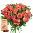 Celebrating the vibrant spirit of Tufnell Park, this arrangement brings together the best of both floral and chocolate luxury. Dominating the image, a splendid bouquet of roses unfurls in layers of coral, peach, salmon, and deep pink, each bloom marked by a stunning gradient from mellow yellow centers to glowing, intensely coloured tips. Some flowers, tight in bud, hint at promise, while others open widely, their soft, velvety petals catching the light with every curve. Tucked amidst this exuberance, the bouquet boasts abundant greenery-eucalyptus and glossy foliage adding verdant depth and character, reminiscent of the leafy parks and gardens lining Tufnell Park's side streets. Just below and left of the bouquet, a rectangular, cream-coloured packet of Thorntons Orange Crisp chocolates stands upright, its logo clear and familiar to local chocolate lovers. Paired with it, two shiny milk chocolate truffles rest temptingly in front, inviting indulgence with their rich aroma and silky surface. The pristine white backdrop ensures every warm floral hue and delicious chocolate detail is highlighted in all its glory. This composition captures a sense of modern romance and celebration-perfect for special Tufnell Park occasions, flower delivery surprises, or as a luxurious treat for life's milestone moments, crafted right in the heart of the community.